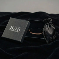 Thumbnail for Black Brother & Sisters gift box, satin pouch and the rose gold Crystal Bar Bracelet on velvet