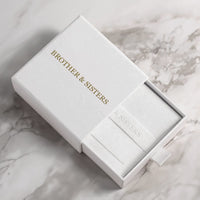 Thumbnail for Infinite Photo Necklace gift box by Brother & Sisters, elegant white packaging for a personalized keepsake.