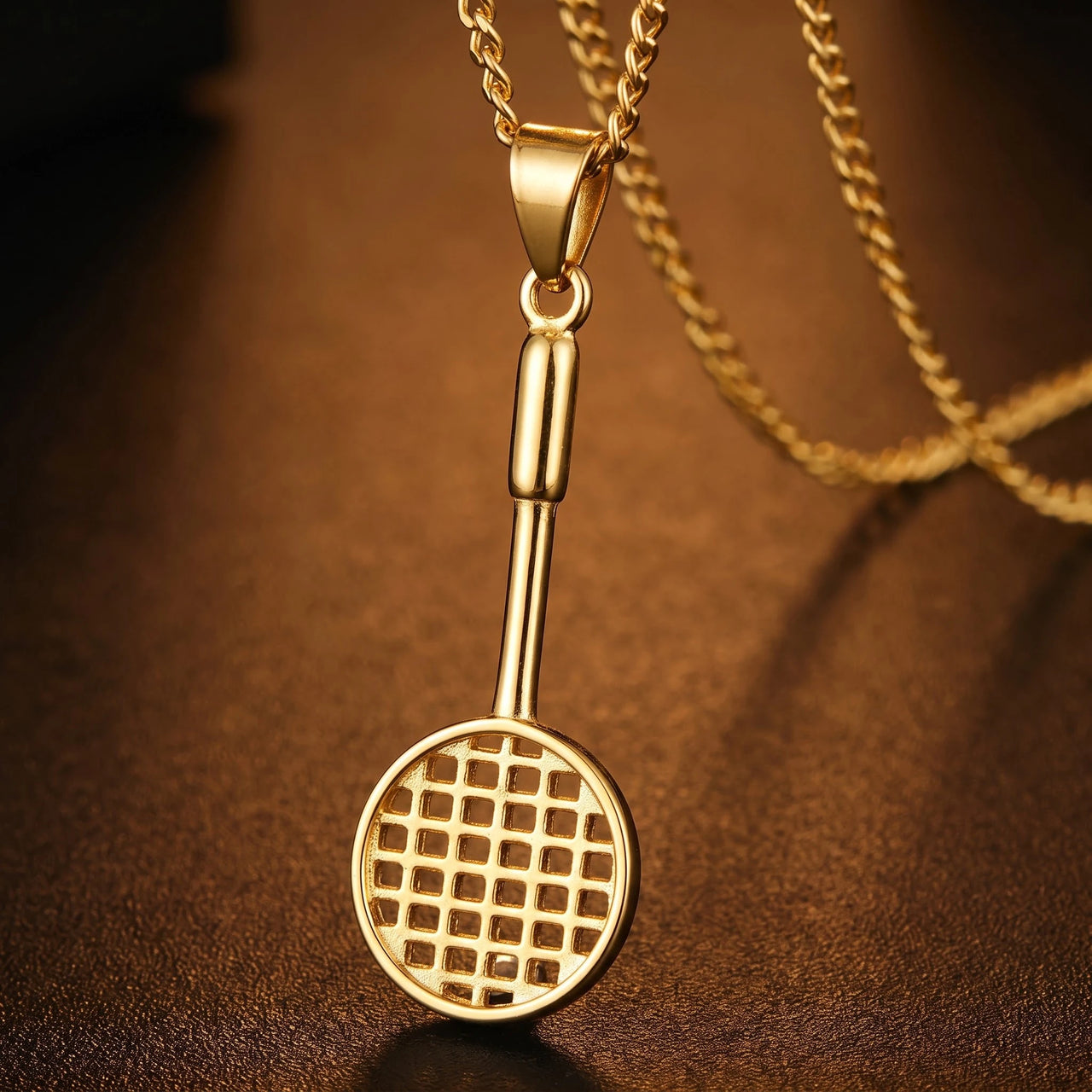 Badminton Racket Necklace Gold – macro detail of the lion head | Brother & Sisters | SKU: Gold