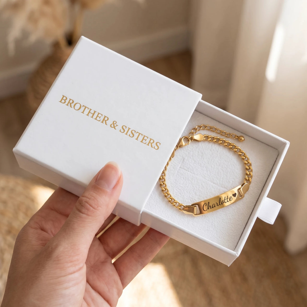 Baby Name Bracelet by Brother & Sisters in gold gift box
