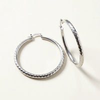 Thumbnail for Diamond Cut Statement Hoops in Silver, product photo | SKU: 41009-silver