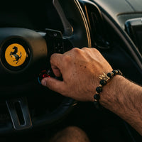 Thumbnail for Gold Crown with Lava Stones – on a Ferrari steering wheel | Brother & Sisters | SKU: 22068514-gold-XS-14-15, 22068514-gold-S-16-17, 22068514-gold-M-18-19, 22068514-gold-L-20-21, 22068514-gold-XL-22-23