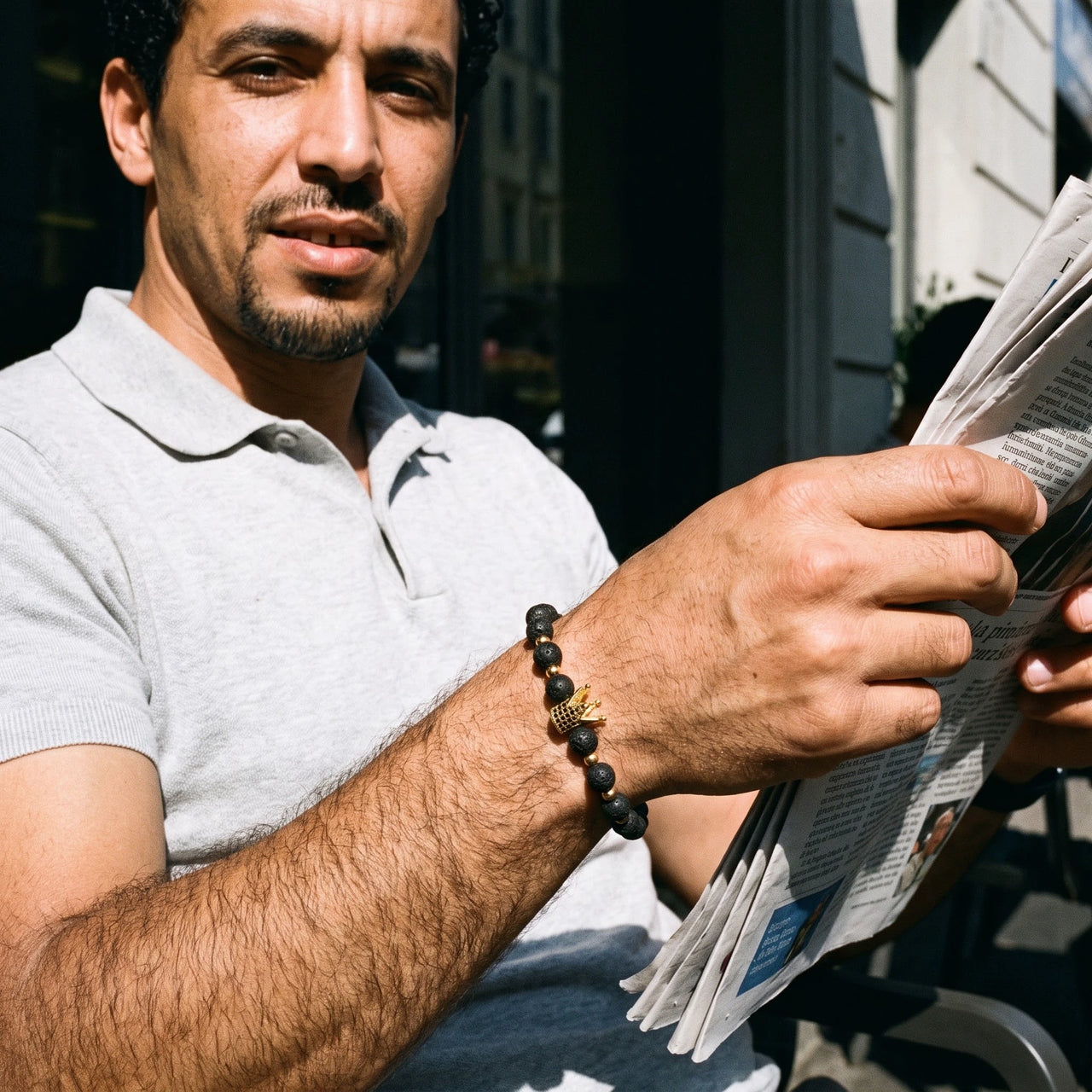 Gold Crown with Lava Stones – reading on a café terrace | Brother & Sisters | SKU: 22068514-gold-XS-14-15, 22068514-gold-S-16-17, 22068514-gold-M-18-19, 22068514-gold-L-20-21, 22068514-gold-XL-22-23