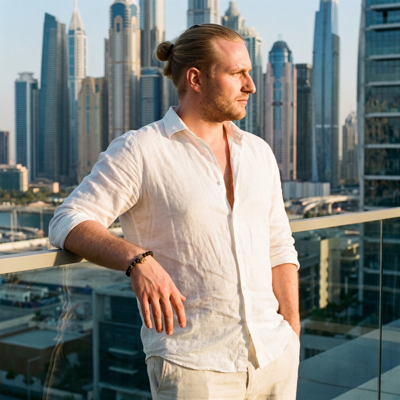 Gold Crown with Lava Stones – man on a Dubai rooftop | Brother & Sisters | SKU: 22068514-gold-XS-14-15, 22068514-gold-S-16-17, 22068514-gold-M-18-19, 22068514-gold-L-20-21, 22068514-gold-XL-22-23