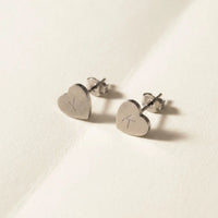 Thumbnail for Heart Initial Stud Earrings in Silver, studio packshot of the pair on a plain background | SKU: heart-initial-silver-a
