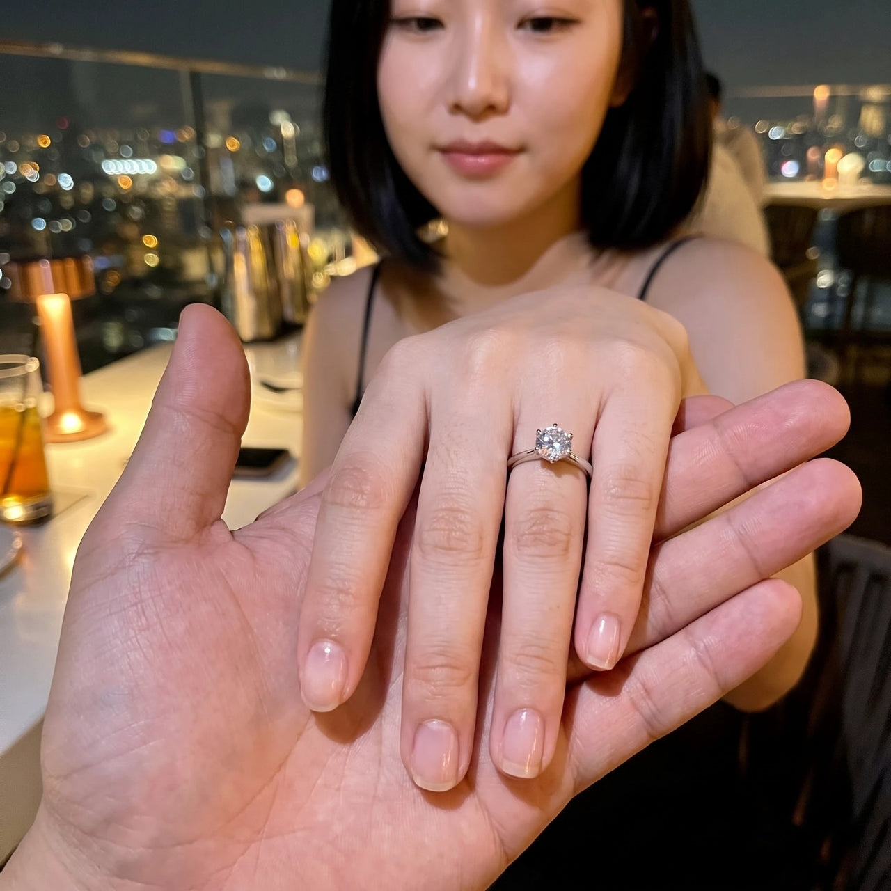A couple holding hands, she wears the silver ring | SKU: 33759698-4.5-silver