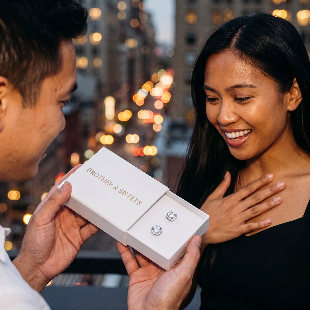 He surprises her with the silver ring in its gift box | SKU: 505185-white
